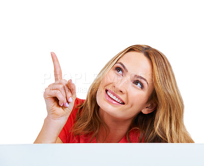 Buy stock photo Woman, poster and pointing at information for communication in studio, announcement or peeking on white background. Female person, billboard placard as mockup for promotion, advertising or signage