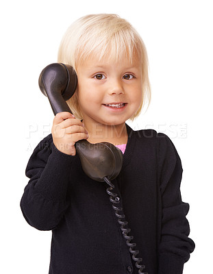 Buy stock photo Girl child, vintage telephone and portrait on studio background of communication, conversation and contact. Happy kids face, retro phone call and connection of antique electronics on white background