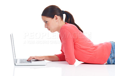 Buy stock photo Laptop, studio floor and woman reading internet, website or typing digital web search for research project. Online shopping promo, e commerce sales or relax model profile isolated on white background