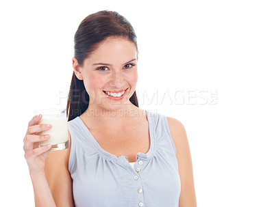 Buy stock photo Studio portrait, happy woman and glass of milk for vitamin D healthcare benefits, bone health or nutritionist hydration drink. Calcium dairy product, mockup and model isolated on white background