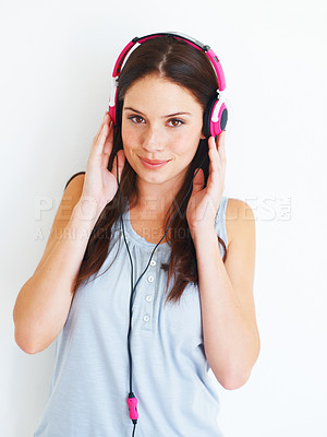 Buy stock photo Music headphones, portrait and woman listening to fun girl song, wellness audio podcast or radio sound. Studio smile, happy freedom and gen z model streaming edm playlist isolated on white background
