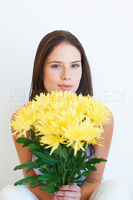 Buy stock photo Flower bouquet, face portrait and studio woman with floral product, sustainable gift or yellow spring present. Nature growth, organic beauty and eco friendly model girl isolated on white background