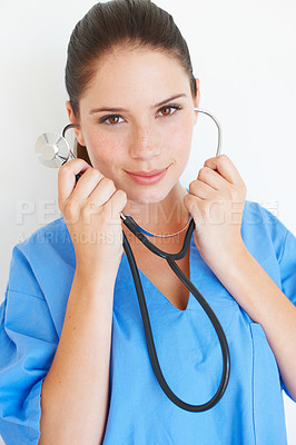 Buy stock photo Studio portrait, listening and nurse with stethoscope for nursing career, medical healthcare or cardiology health. Medicine doctor, caregiver woman or hospital surgeon isolated on white background