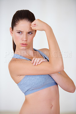 Buy stock photo Woman, face or serious in studio with flex for fitness, wellness or workout strength with sportswear. Person, athlete or thinking for biceps, exercise or training on white background or mock up space