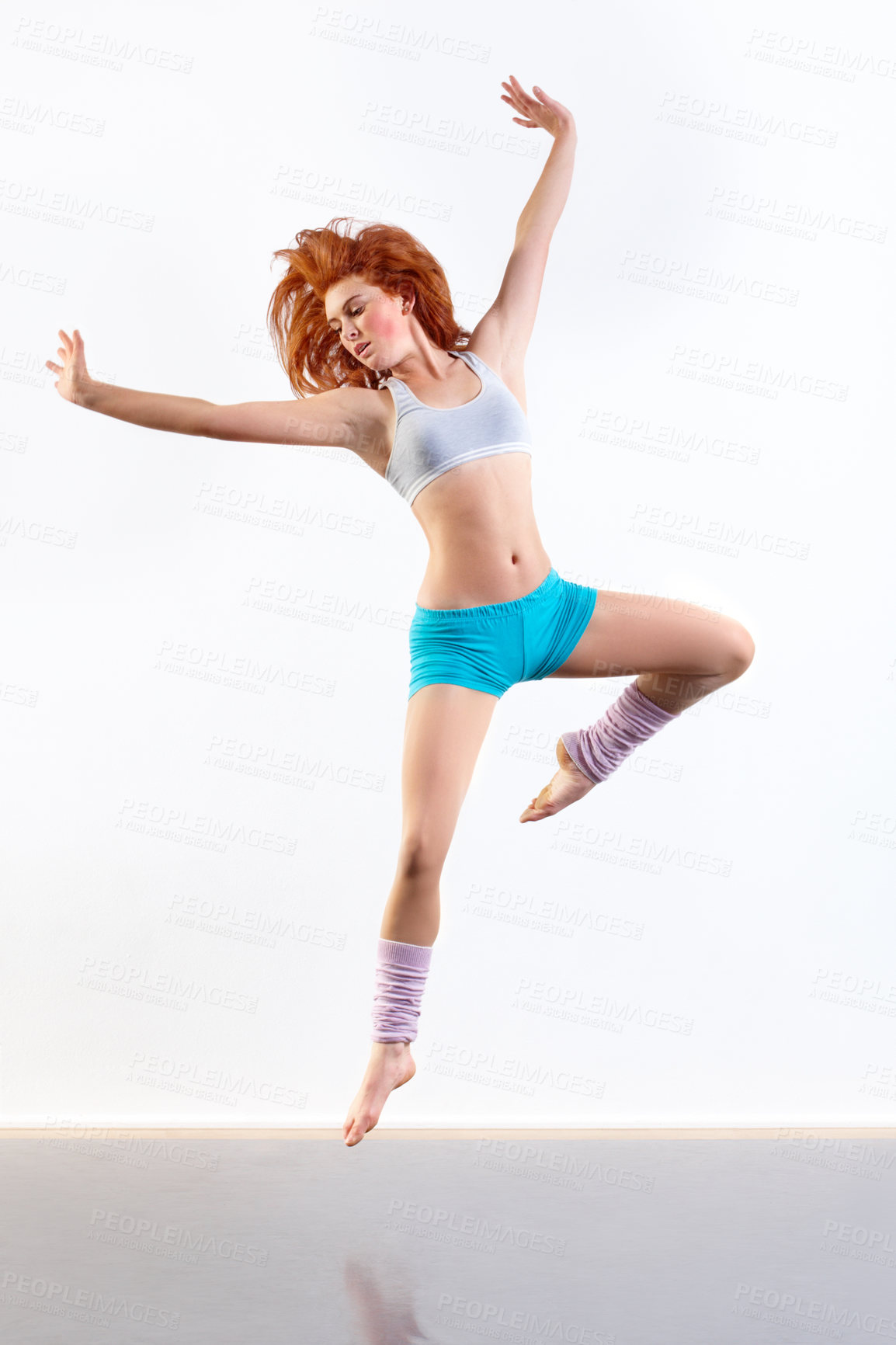 Buy stock photo Woman, dancer and jump pose in studio for creative expression exercise, white background or mockup space. Female person, aerobics and workout gymnastics or fit leap as energy, practice or training