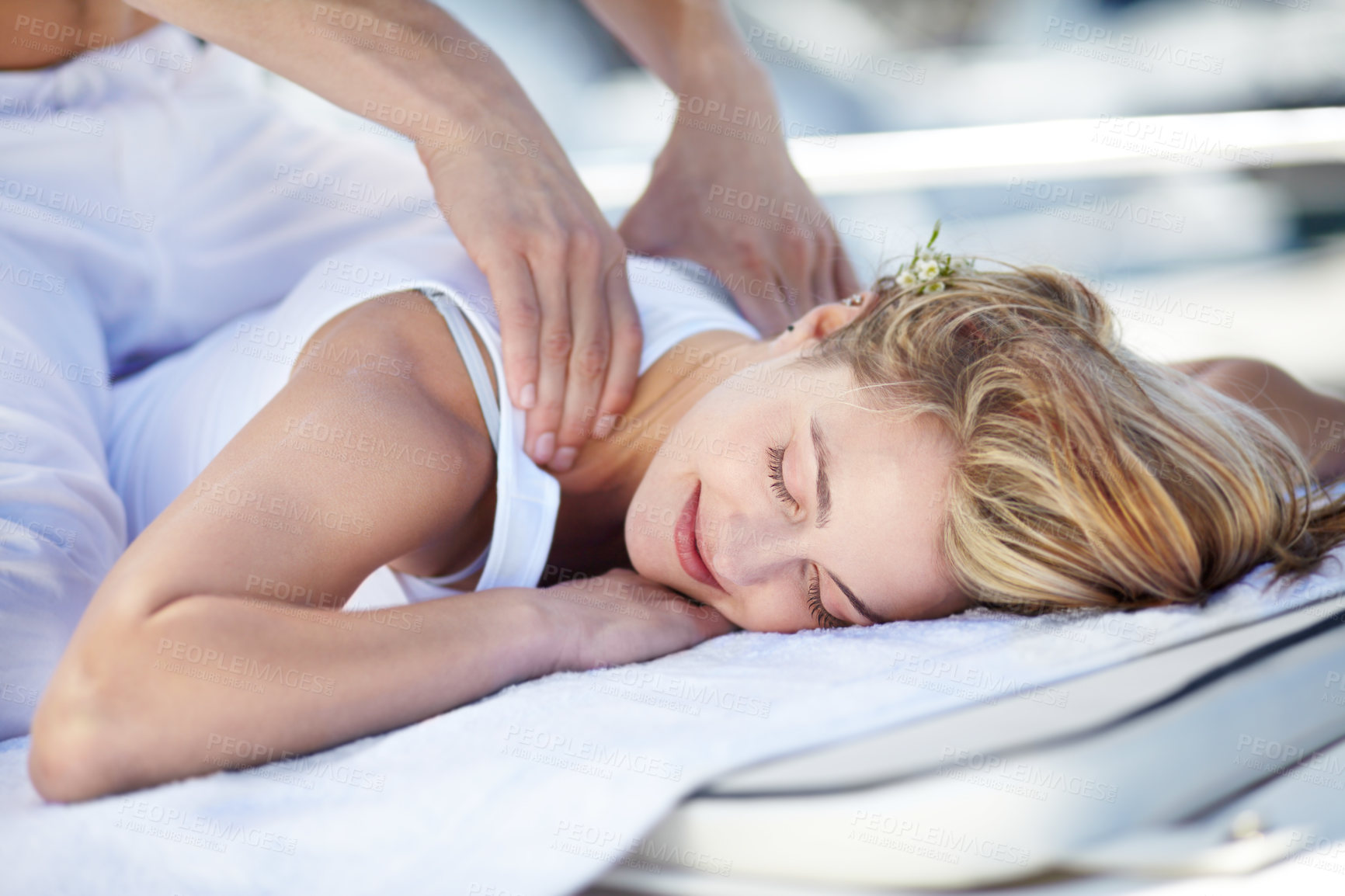 Buy stock photo Young woman receiving a relaxing massage