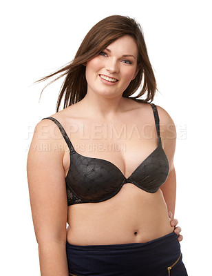 Buy stock photo Portrait, smile and bra with a plus size woman in studio isolated on a white background for body positivity. Beauty, wind and a happy young model looking natural or confident in her underwear