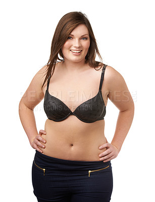 Buy stock photo Portrait, happy and bra with a plus size woman in studio isolated on a white background for body positivity. Beauty, smile and a confident young model looking natural in her underwear for wellness