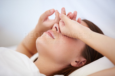 Buy stock photo Tired, wake up and woman cover eyes in bed, sleeping or fatigue in morning from insomnia. Frustrated, person and hands on face, exhausted from stress in dream or nightmare in bedroom at home
