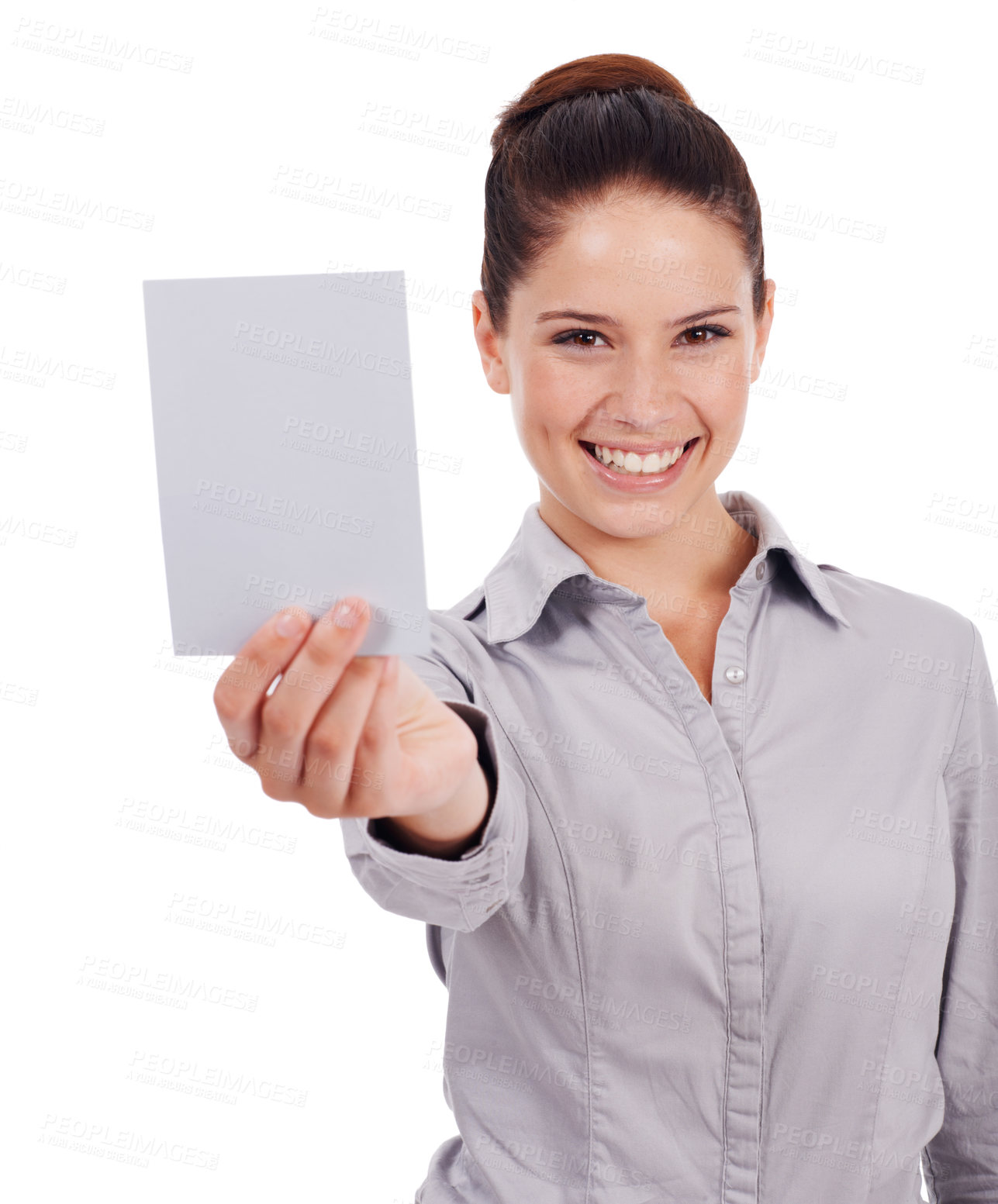 Buy stock photo Studio portrait of an attractive young woman holding up a small blank sign isolated on white