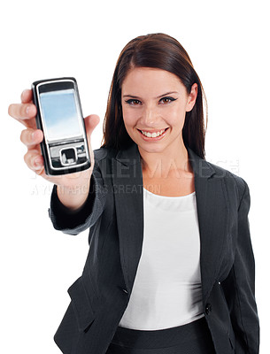 Buy stock photo Studio shot of an attractive young woman holding up a cellphone to the camera isolated on white