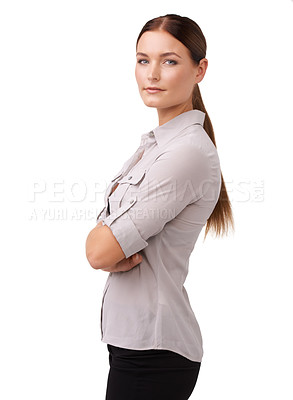 Buy stock photo Cropped shot of an attractive young woman standing with her arms folded isolated on white