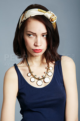 Buy stock photo Face, woman in vintage fashion with attitude or moody, frown or frustrated pose on studio background. Model, girl and upset or tired expression in retro clothing and style, magazine or beauty
