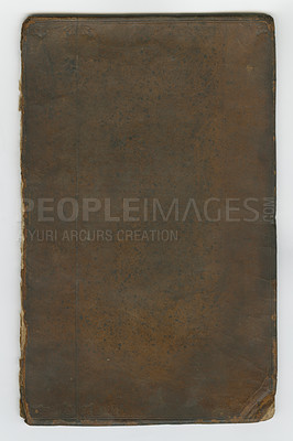 Buy stock photo Old book, vintage and cover of antique manuscript, scriptures or ancient literature against a studio background. Closeup of blank historical novel, journal or guide in brown, dusty or classic history