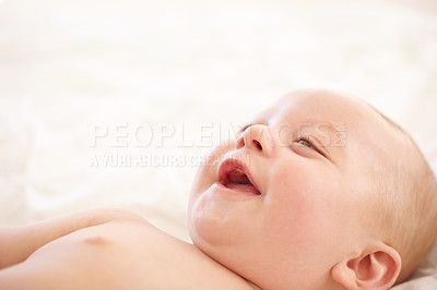 Buy stock photo Baby, smile on bed and funny laugh of young child in development, innocent and relax at home. Happy kid, excited infant in nursery and rest in bedroom, healthy body and cute, adorable or mockup space
