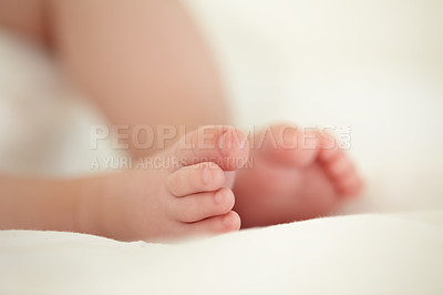 Buy stock photo Child, newborn and feet or toes closeup or infant development, safety care or growth support. Baby, foot and soft skin asleep for healthy birth on blanket love or tiny legs or wellness, youth in home
