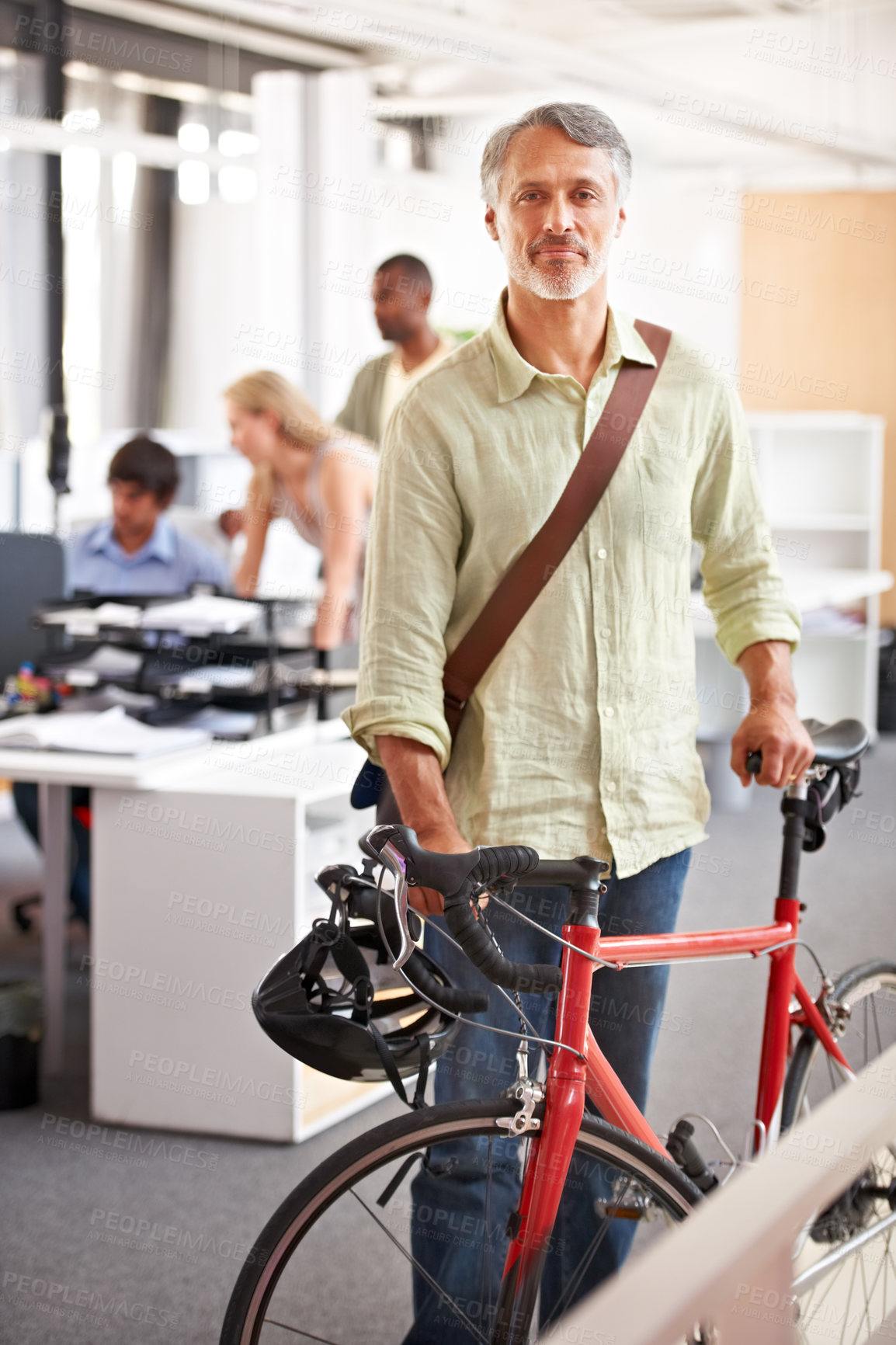 Buy stock photo Mature man, business and bicycle in office with portrait and manager of sustainable company. Ceo, boss and job with eco friendly commute in morning with smile in a creative agency of a professional 