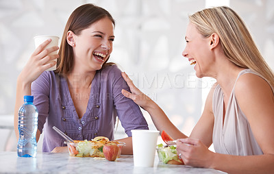 Buy stock photo Laughing, colleagues or friends at lunch in cafeteria with funny conversation, smile and eating. Healthy food, drinks and happy women in cafe for gossip, bonding and employees in break room together.