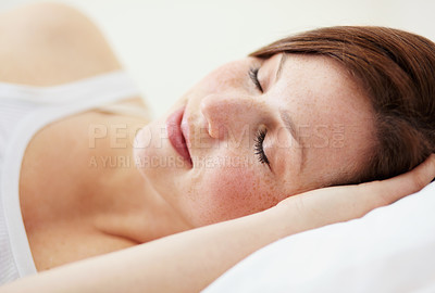 Buy stock photo Rest, sleeping and woman in bed, peaceful and enjoying a calm nap in her home. Eyes closed, dreaming and female person in a bedroom for snooze, cozy and comfort alone on the weekend in a house