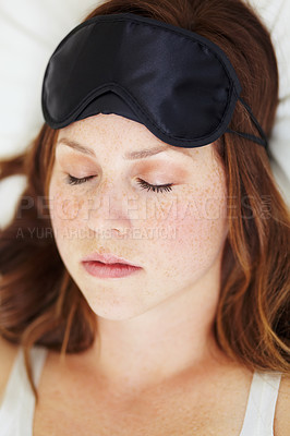 Buy stock photo Sleep, mask and face of woman in bed, resting and peace, silence and quiet in home top view. Relax, nap and tired, fatigue and beauty of female person dream in calm bedroom for morning of self care