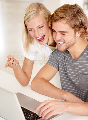 Buy stock photo Laptop, excited and investment with a young couple in their apartment for online shopping or planning together. Computer, bank or pointing with a happy man and woman in the home for portfolio growth