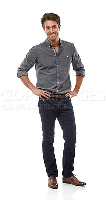 Buy stock photo Full-length portrait of a handsome young man standing with his hands on his hips