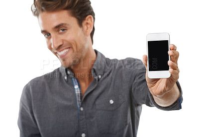 Buy stock photo Business man, portrait and phone screen for advertising space, presentation or mobile newsletter in studio on white background. Happy worker, smartphone mockup or review sales information coming soon