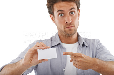 Buy stock photo Portrait, surprise and man pointing at card, mockup and advertising space isolated on a white studio background. Face, shock and show blank paper for promo, info or commercial, marketing or hand sign