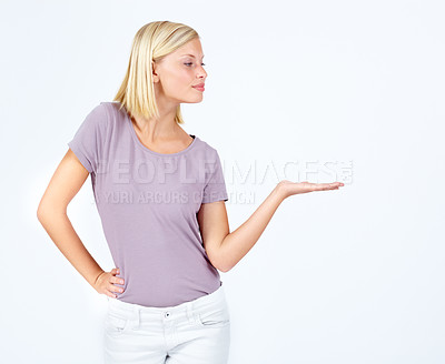 Buy stock photo Woman, showing and hand for marketing space, advertising mock up and product placement mockup on studio background. Model, hand gesture and promotion for sales deal, logo branding and about us design