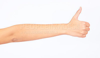 Buy stock photo Woman, hand and thumbs up on studio background in success goals, vote support or opinion on white mockup backdrop. Zoom, model and yes finger gesture in thank you, winner news or good luck motivation
