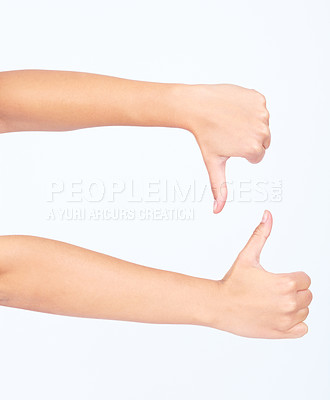 Buy stock photo Hands, thumbs up and thumbs down in yes or no gesture for vote, poll or social media likes on white background. Sign language, finger or hand sign in agreement or disagreement for ASL website review.