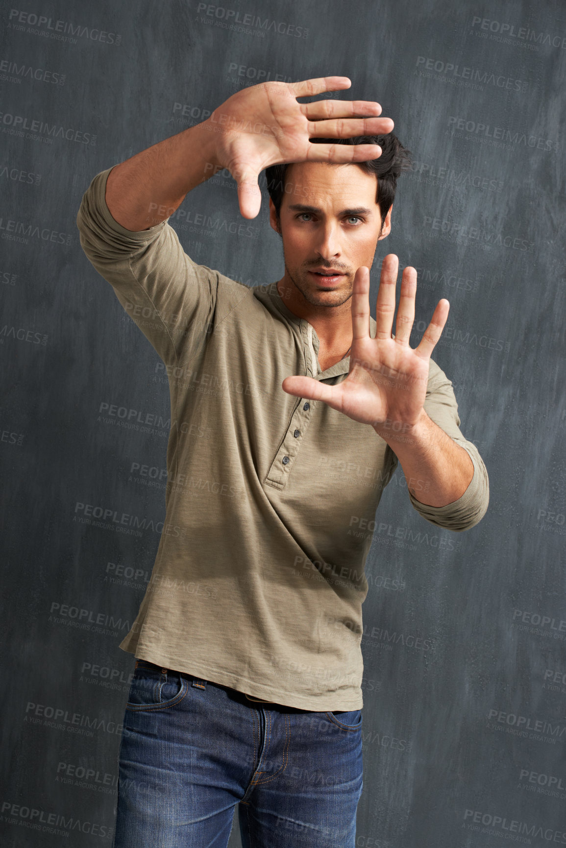 Buy stock photo Hands, selfie frame and portrait of man in studio for photography against grey background. Finger, border and face of male model with social media, profile picture and memory or screenshot gesture