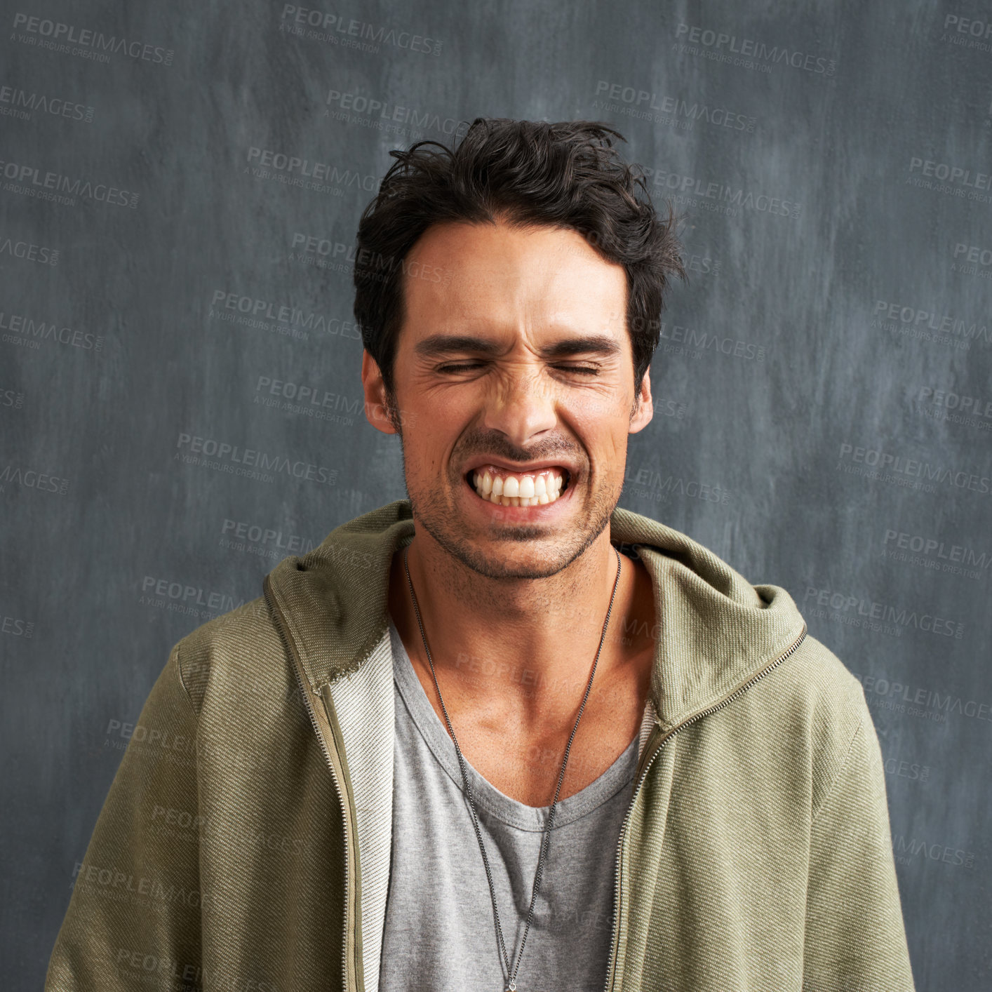 Buy stock photo Funny, face and man in studio with crazy, gesture or facial expression against grey background. Joke, eyes closed and male model with goofy personality, good mood or silly, comic or unique humor