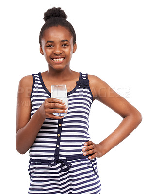 Buy stock photo Studio portrait of a young african american girl drinking a glass of milk isolated on white
