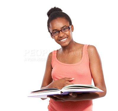 Buy stock photo Studio portrait of a young african american girl reading a book and wearing glasses isolated on white