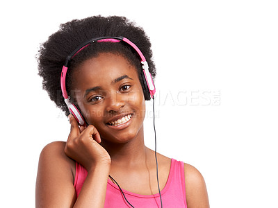 Buy stock photo Headphones, smile and portrait of black girl in a studio listening to music, album or playlist. Happy, teenager and young African child model streaming a podcast, song or radio by white background.