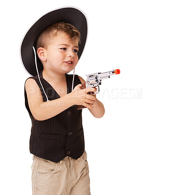 Buy stock photo Kid, cowboy hat and play with gun in studio isolated on a white background mockup space. Child, toy pistol and western costume for halloween, shooting and cute young boy dress up on holiday for fun