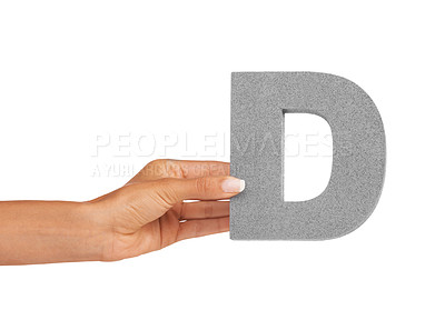 Buy stock photo Hand of woman, capital letter D and presentation of consonant isolated on white background. Character, font and palm with English alphabet typeface for communication, reading and writing in studio.