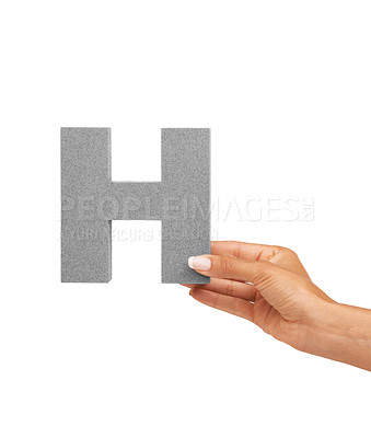 Buy stock photo Hand of woman, capital letter H and presentation of consonant isolated on white background. Character, font and person with English alphabet typeface for communication, reading and writing in studio.