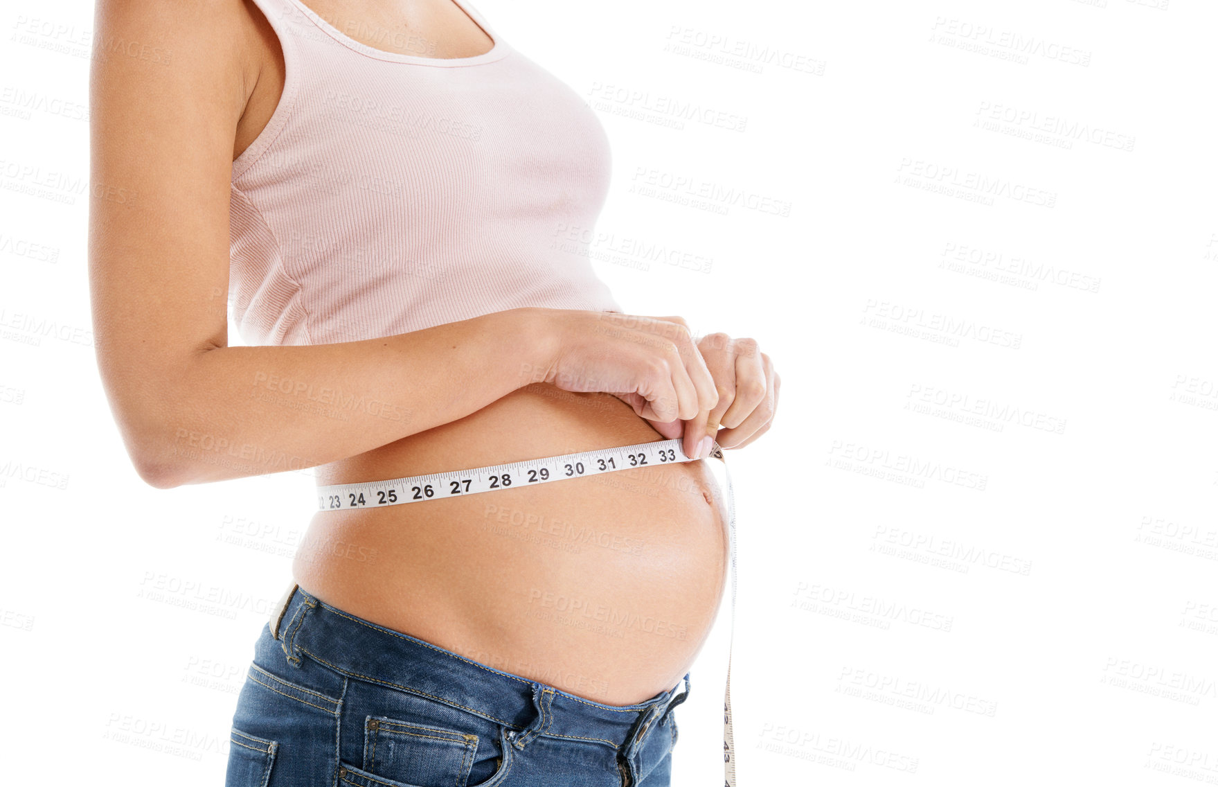 Buy stock photo Pregnant woman, measuring tape and stomach on a white background to check growth, development and health. Abdomen, wellness and pregnancy for self care, diet and healthy progress goals on mock up
