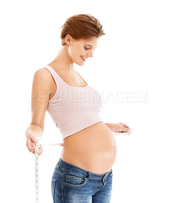 Buy stock photo Woman, pregnancy stomach and measuring tape for baby wellness, healthcare support and lifestyle motivation in white background studio. Mother, pregnancy and maternity wellbeing or measuring belly