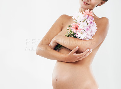 Buy stock photo Pregnancy, naked and pregnant, woman with flowers and nature, skin and mother isolated on white background. Beauty mockup, growth and development, wellness and love, stomach with baby and bouquet