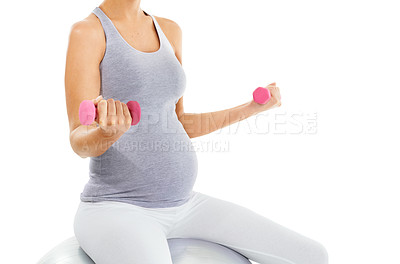 Buy stock photo Woman, pregnant and exercise ball with dumbbell in studio for training, health or self care by white background. Pregnancy fitness, development and isolated workout for future, balance or motivation