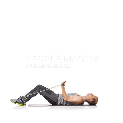 Buy stock photo Exercise, man and resistance band with workout, core training and wellness isolated on white studio background. Mockup space, person or model with health, stretching or progress with energy or sports