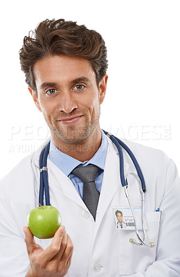 Buy stock photo Doctor, man and portrait in studio with apple and advice in healthcare for health diet in medicine. Nutritionist, face and fruit for wellness in vitamins, care and natural food by white background
