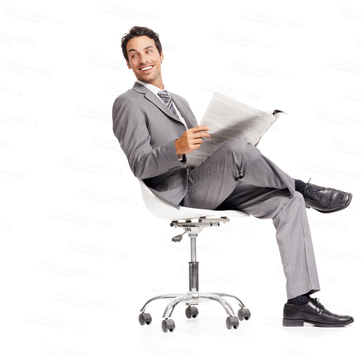 Buy stock photo Business man, happy and reading newspaper in studio, headlines and information on current events. Businessperson, smile and knowledge or announcement on paper, news and update by white background