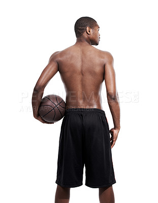 Buy stock photo Rearview shot of a basketball player standing shirtless in the studio