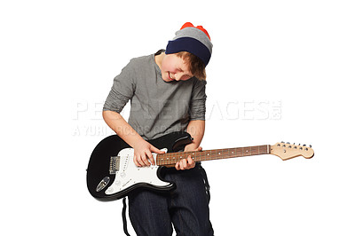 Buy stock photo Teenager boy, guitar and studio performance for rock music, playing or concert by white background. Creative person, artist kid or child musician with instrument for art, song or band with fashion