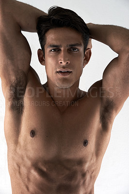 Buy stock photo Cropped shot of a handsome and muscular young man