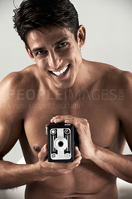 Buy stock photo Shirtless, man and portrait with vintage camera for sexy, photography or recording happiness. Muscular, model and smile with retro photographer, hobby or topless person with creative film project
